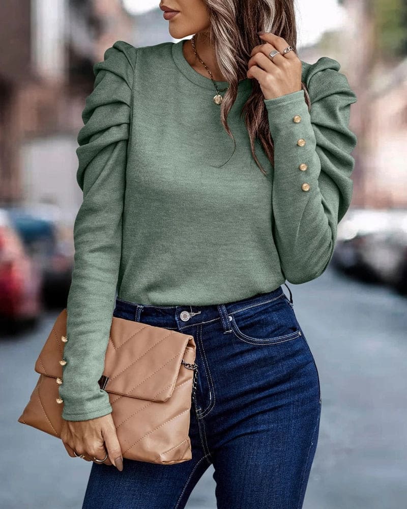 Blusa com mangas bufantes longas e gola redonda - Eva