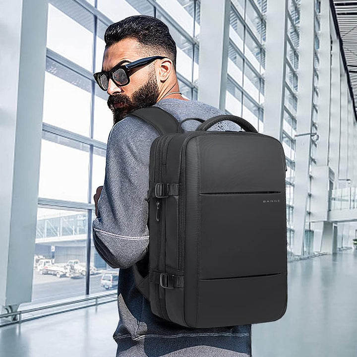 Expandable 26–45L Waterproof Travel Backpack with Laptop Sleeve & Duffle Carry