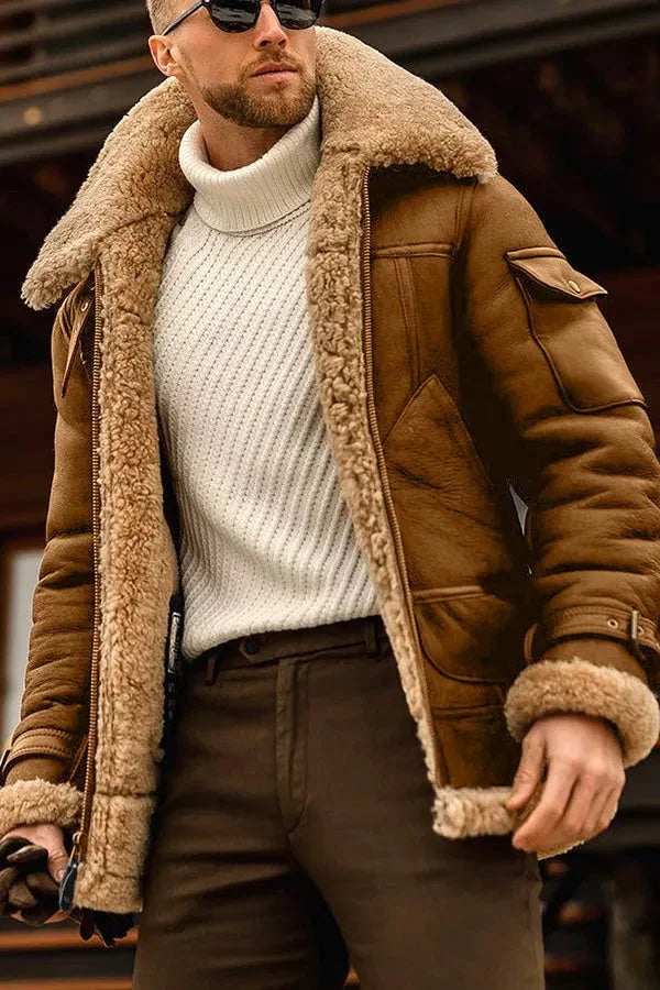 Close view of the camel brown suede-look jacket with tan shearling collar and cuffs, worn over a cream turtleneck 6