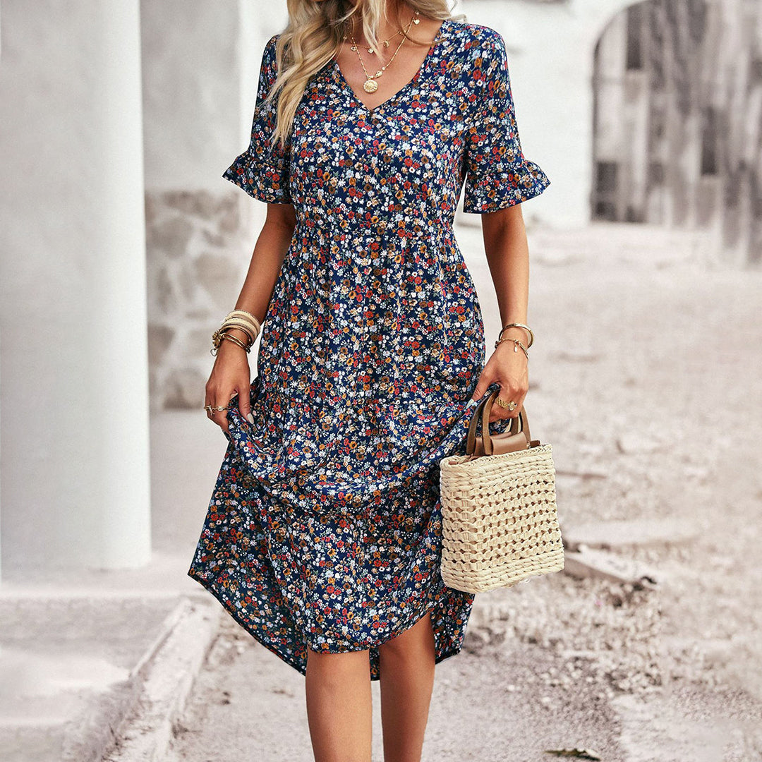 Vestido com estampa floral em comprimento midi - Leila