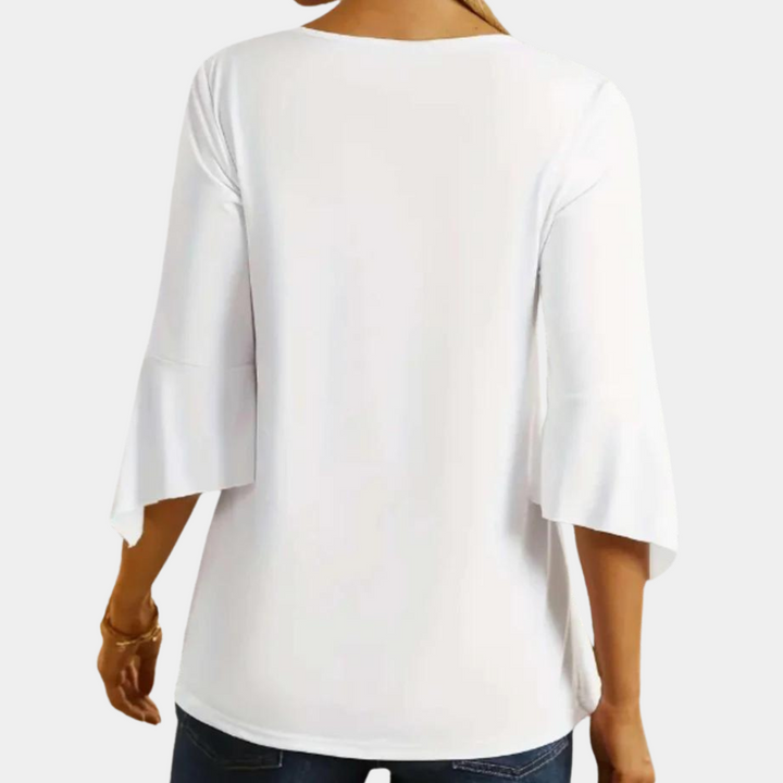 Weiße Damenbluse aus Baumwolle, 3/4-Ärmel, lässig, elegant, Rückansicht.