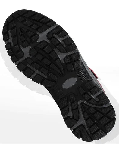 Underside of the boot showing the black and gray tread pattern with deep lugs 3
