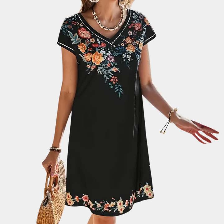 Schwarzes Sommerkleid mit Blumenmuster, V-Ausschnitt, kurze Ärmel, Damenmode, elegant.
