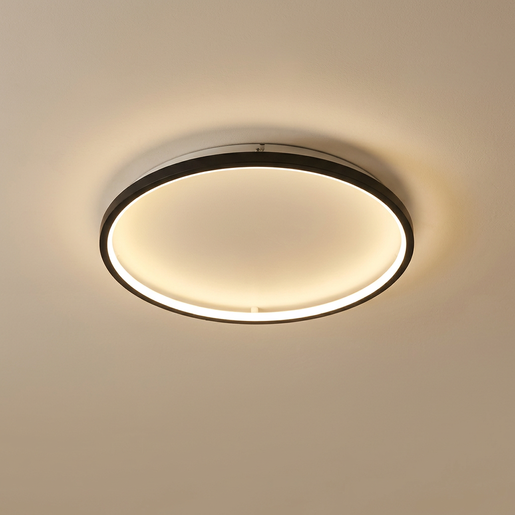 Round ceiling light with a black frame and warm glowing inner ring, mounted flush on a beige ceiling 3