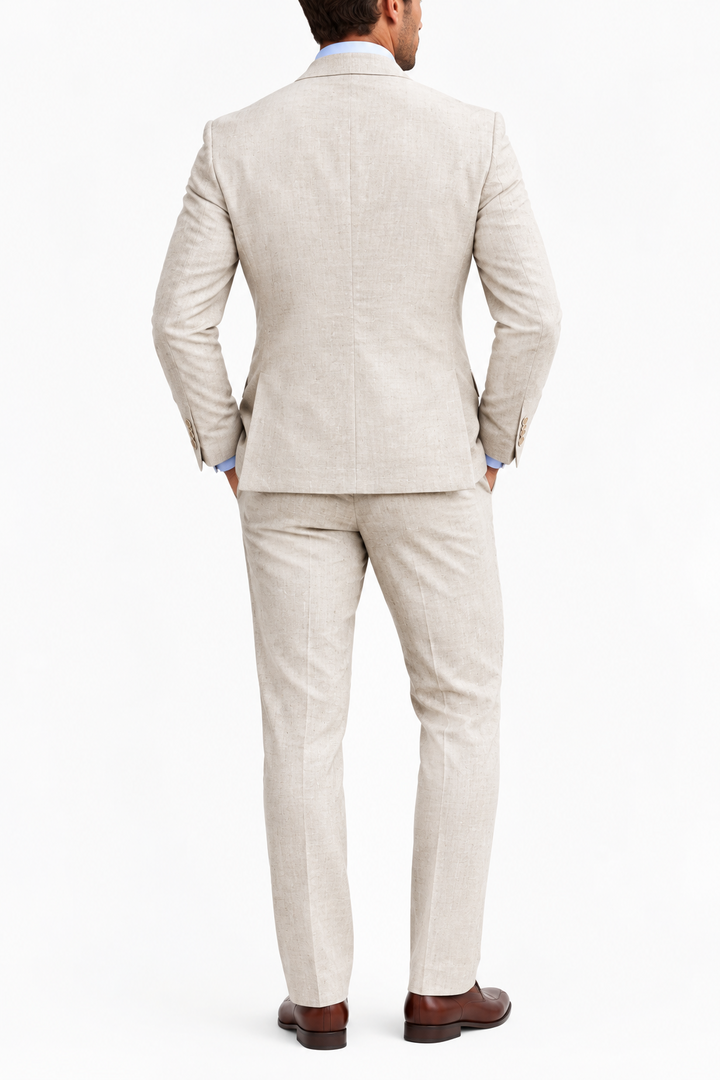 Back view of the beige suit jacket and trousers worn with brown leather shoes on white background 7