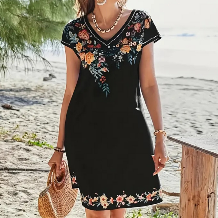 Schwarzes Sommerkleid mit Blumenmuster, V-Ausschnitt, Strand, Damenmode, elegant.