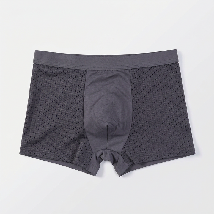Flat lay of gray boxer briefs with perforated mesh side panels and a smooth center 4