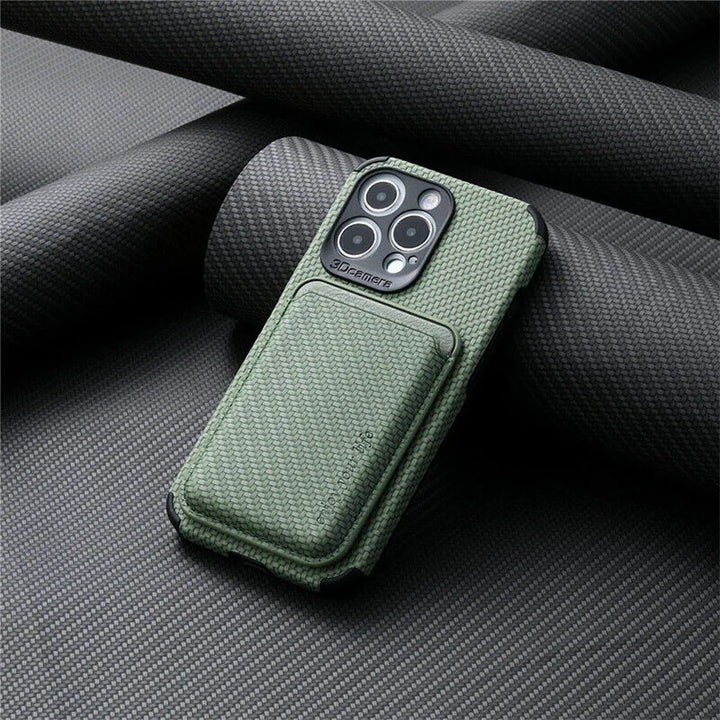 Green woven-texture case with attached card holder, resting on rolled dark fabric 7