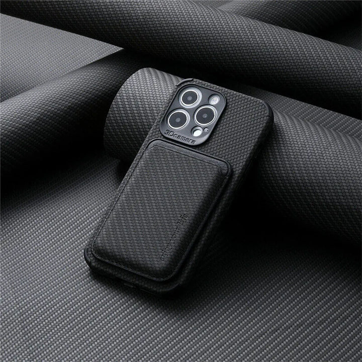Black woven-texture case with the card holder attached, resting against rolled carbon-pattern fabric 4