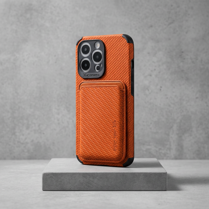 Orange woven-texture case with card holder and black corners, standing upright on a gray concrete platform 6
