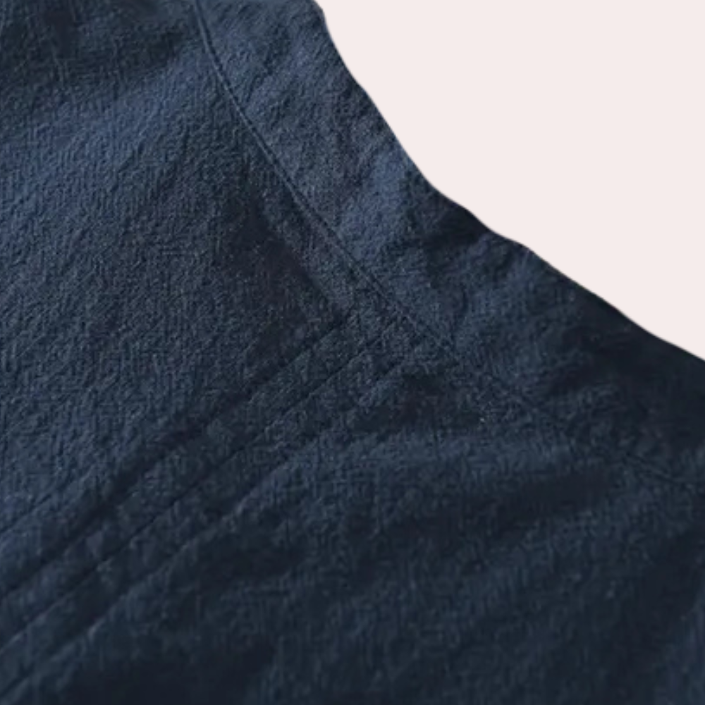 Dunkelblauer Leinenstoff, Nahaufnahme, Textur, hochwertiges Material, Mode, Detailansicht.