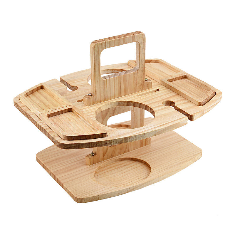 Empty light wooden wine table on a white background, showing the handle, bottle hole and snack trays 4
