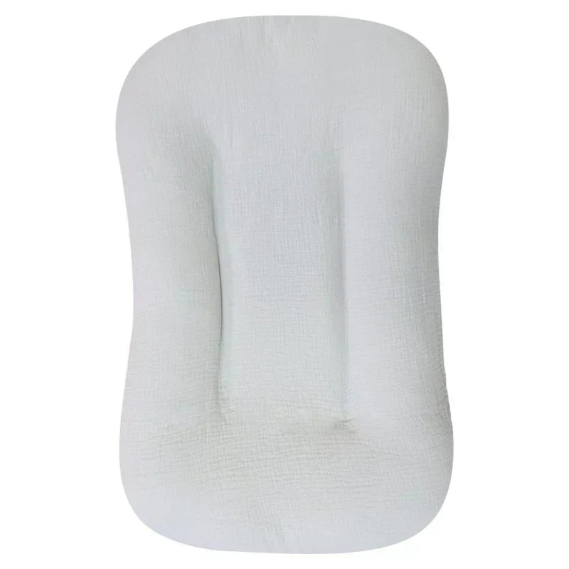 Empty pale gray crinkled-cotton lounger with raised sides, shown flat from above 10
