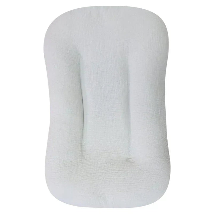 Empty pale gray muslin lounger with a center channel, shown from above 11