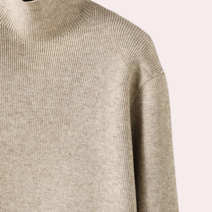 Beiger Rollkragenpullover aus Wolle, elegantes Design, warme Wintermode für Damen.
