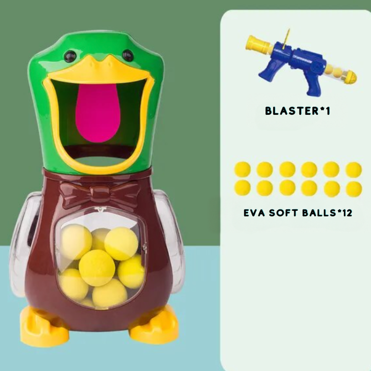 Duck target with bow tie beside one blaster and a group of twelve foam balls 7