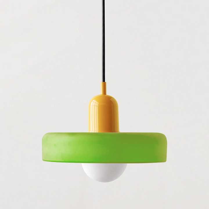 Pendant light with a lime green disc shade, yellow cap and black cord 57