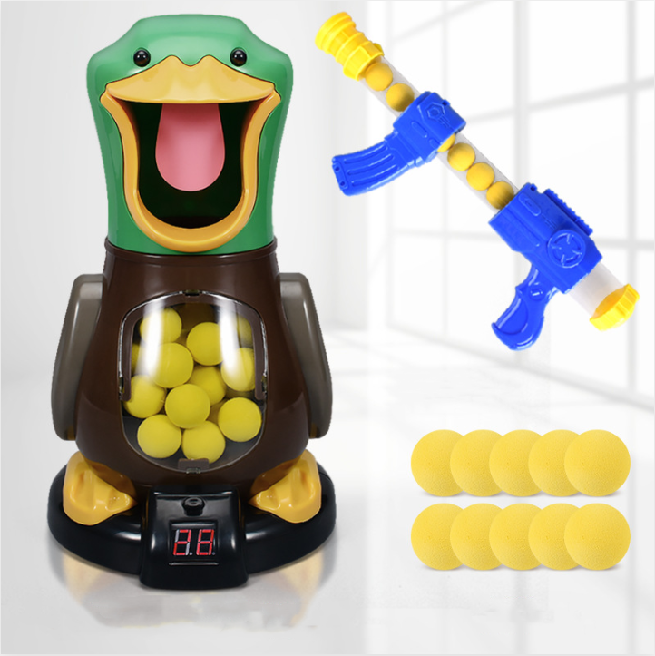 Duck target with score display, one blaster and ten loose yellow foam balls laid out together 5