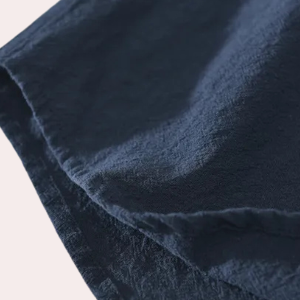 Dunkelblauer Leinenstoff, Nahaufnahme, Textur, hochwertiges Material, Bekleidungsdesign.