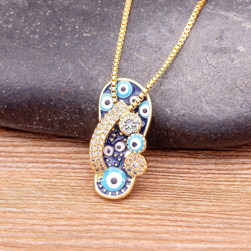 Gold Chain with Flip Flop Pendant and Evil Eye - Selma-Nora Luxe