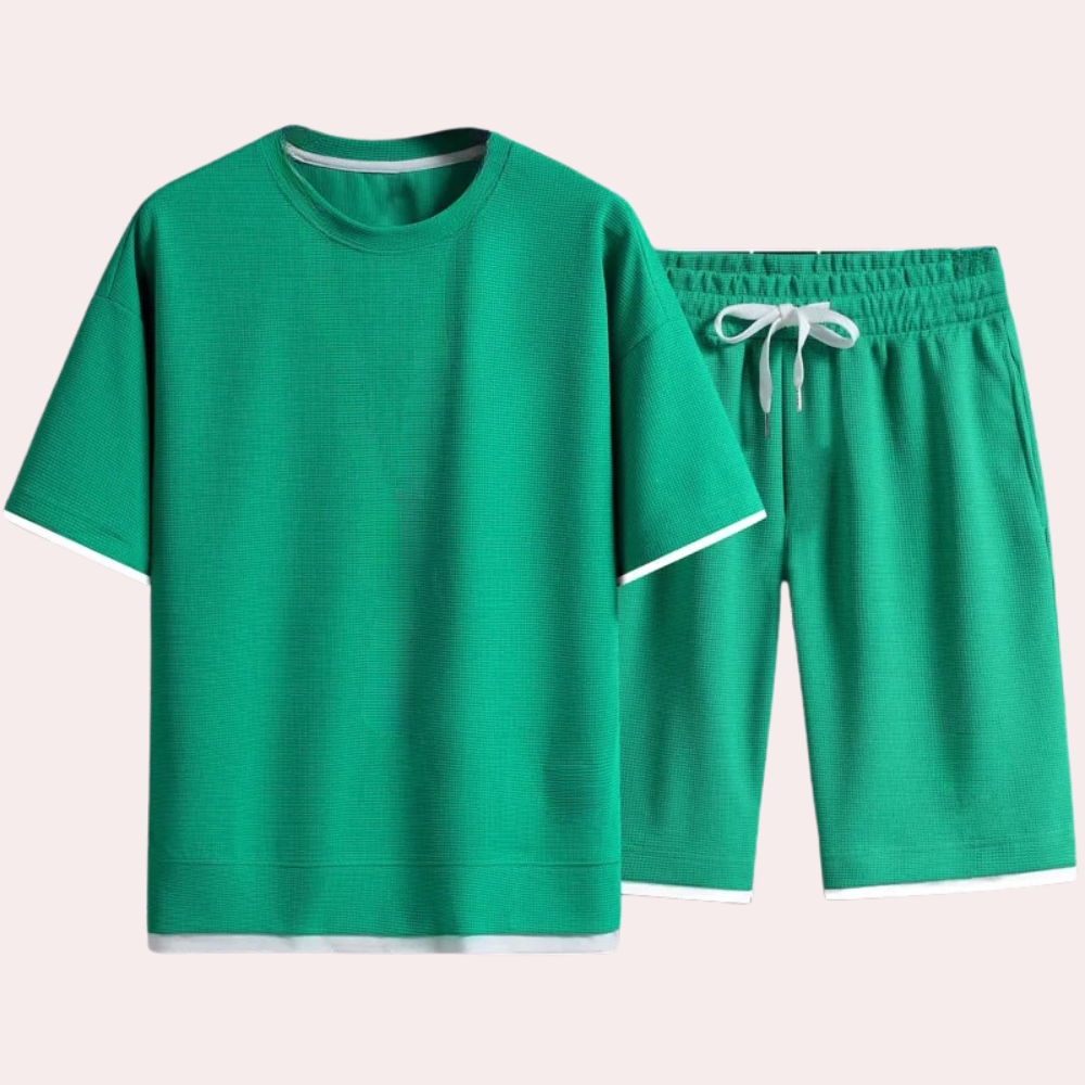 Grünes Herren-Shorts-Set aus Baumwolle, T-Shirt und Shorts, sportlich, bequem.