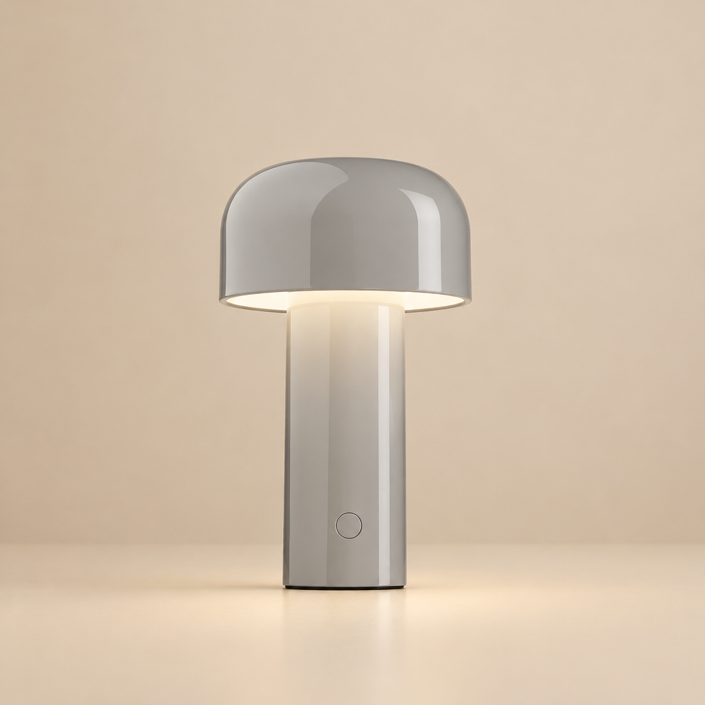 Glossy light gray mushroom lamp softly lit on a beige background, button visible on the stem 32