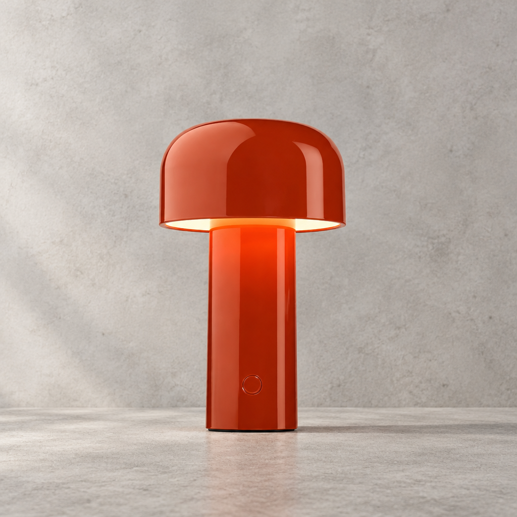 Glossy red lamp lit against a concrete-textured wall, button visible on the stem 29