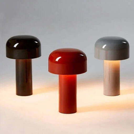 Three mushroom lamps in dark brown, red and gray, with their stems softly glowing 26