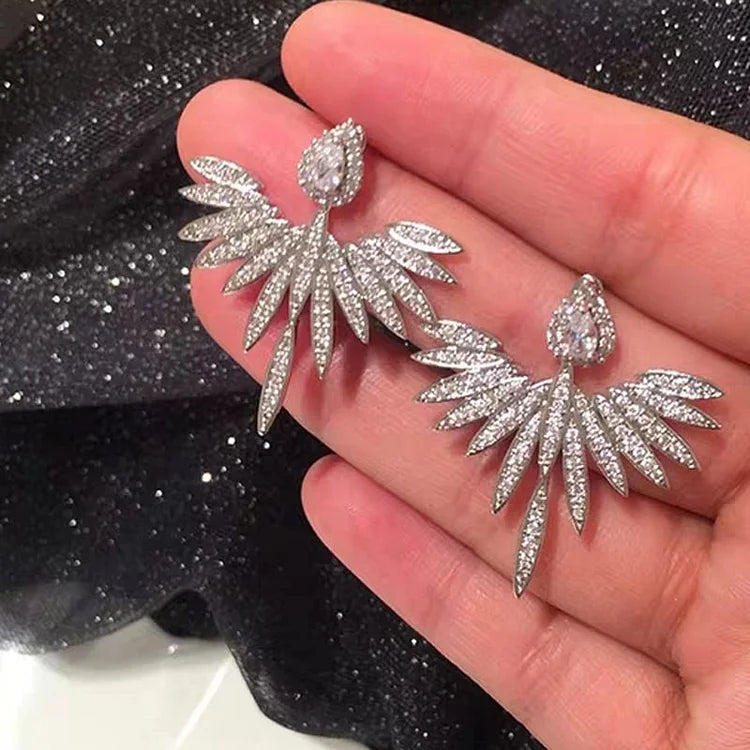 Silver Angel Wing Earrings - Celeste-Nora Luxe