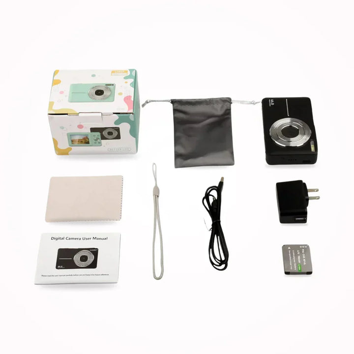 Flat lay of a black camera with its box, pouch, wrist strap, cable, charger, battery, cloth and manual 7