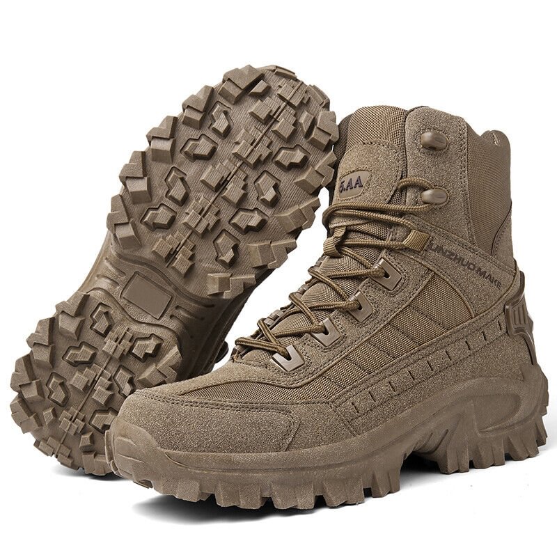 Brown boot standing next to its upturned mate, showing the aggressive lug tread on the sole 16