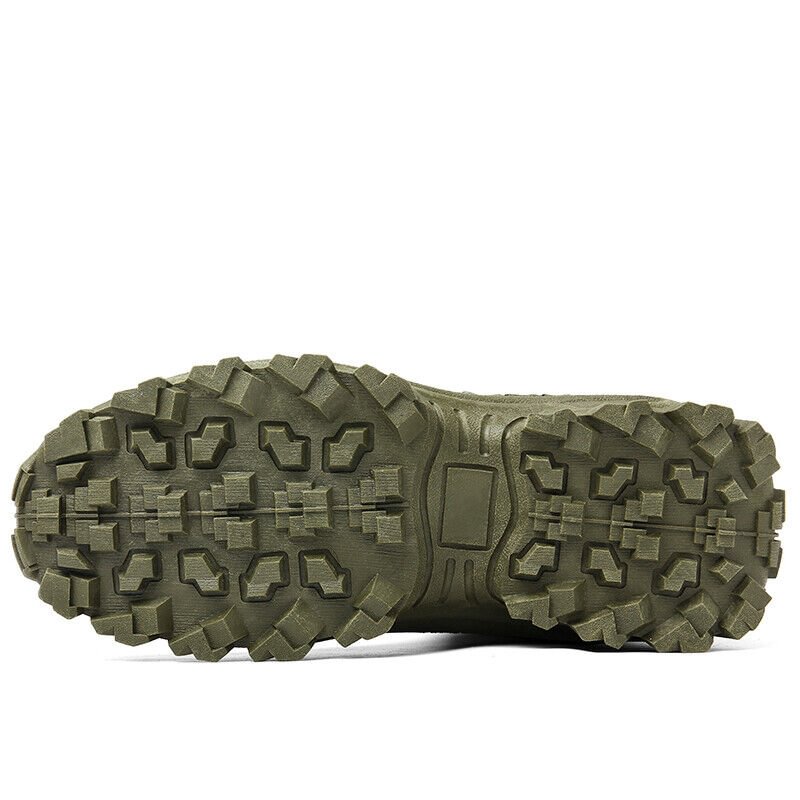 Underside of an olive green boot showing the deep, blocky lug tread pattern and heel panel 22