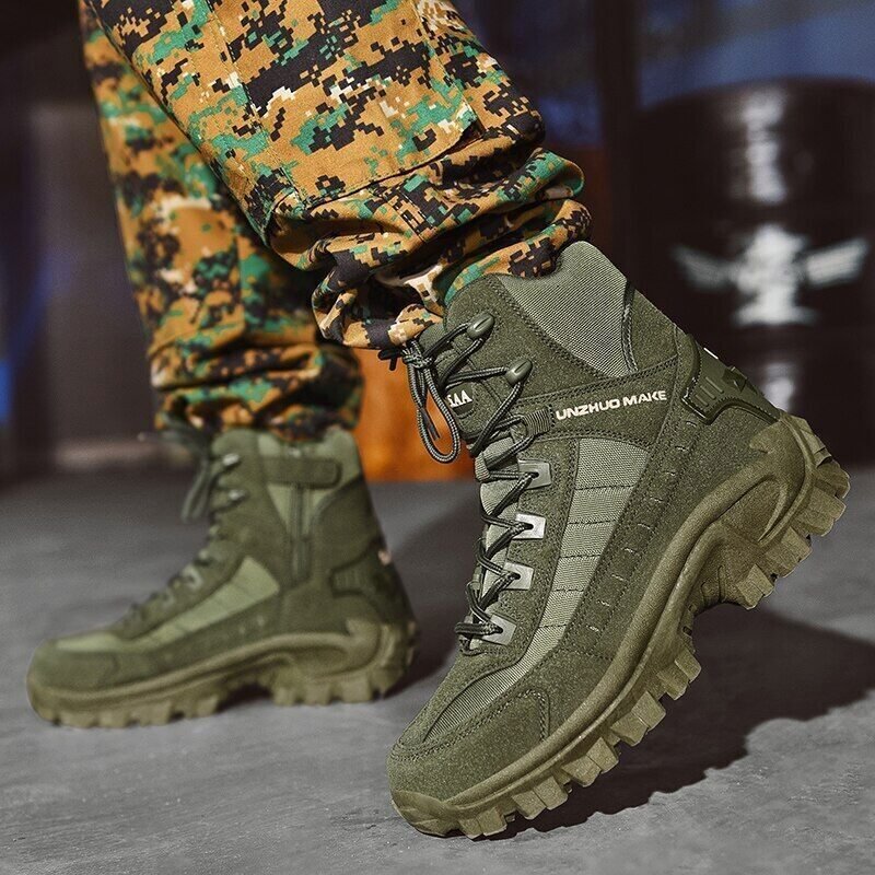 Olive green high-top boots with black laces, one foot raised, worn with digital camouflage pants 4
