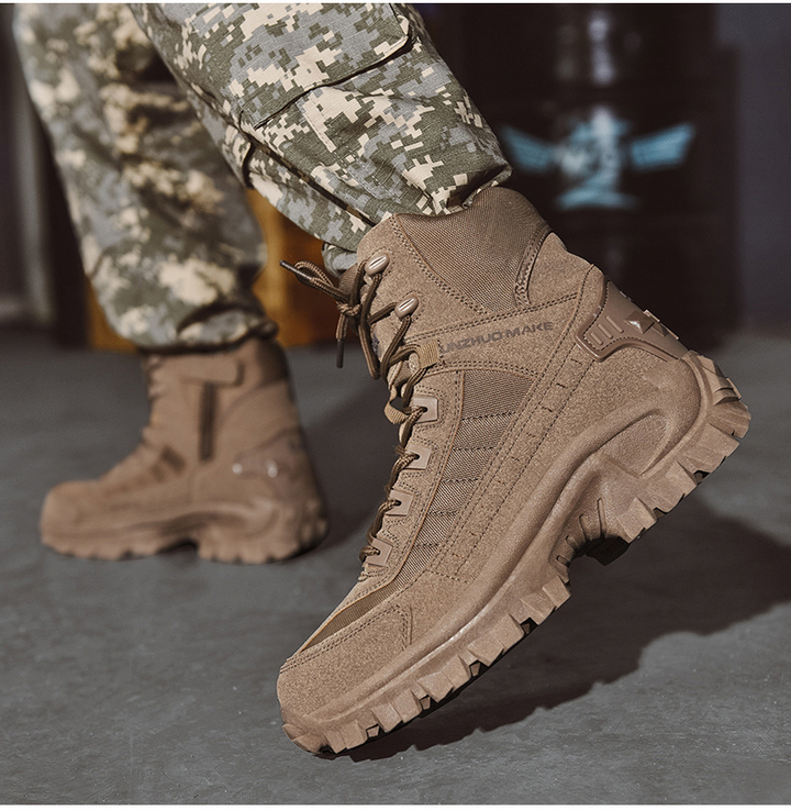 Brown suede high-top boots worn with gray pixel camouflage pants, one boot lifted to show the thick sole 5