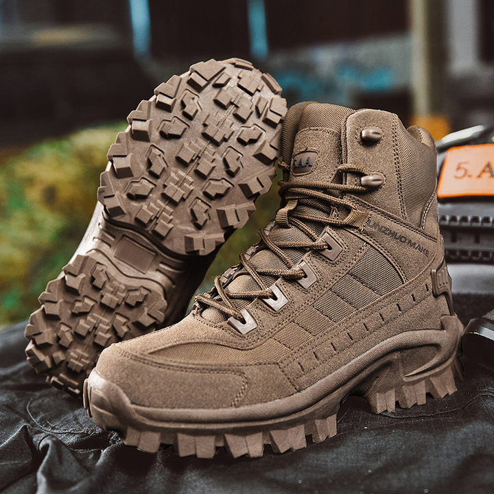 Brown high-top boot standing beside its upturned mate, showing the deep lug tread of the outsole 8