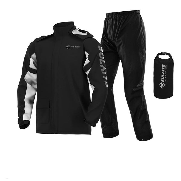 All-black rain jacket with light gray sleeve accents, black pants and a black dry bag laid out together 8