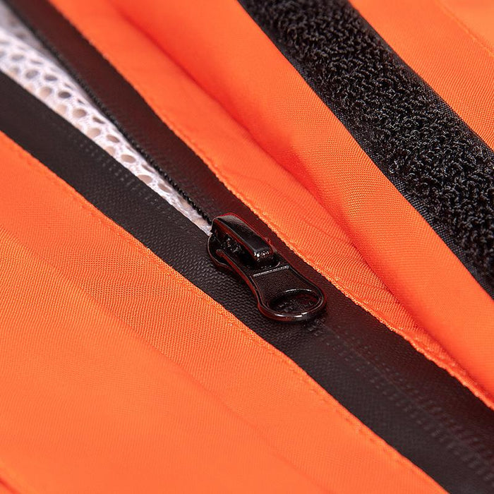 Close-up of a black waterproof zipper and hook-and-loop placket on bright orange fabric, with white mesh lining visible 3