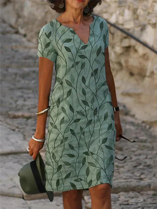 Vestido encantador com um design encantador em verde esmeralda - GrüneAura